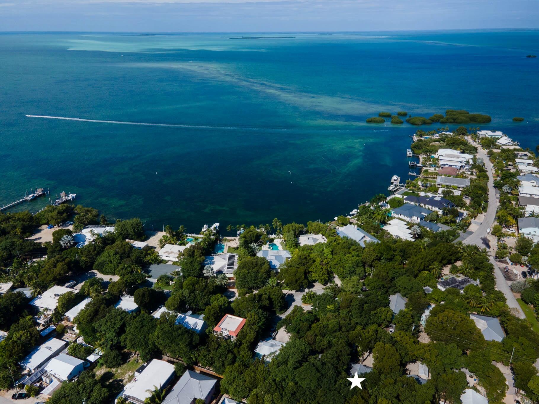 150 Apache Street Tavernier, FL 33070 - Photo 2 of 32 a view of a lake