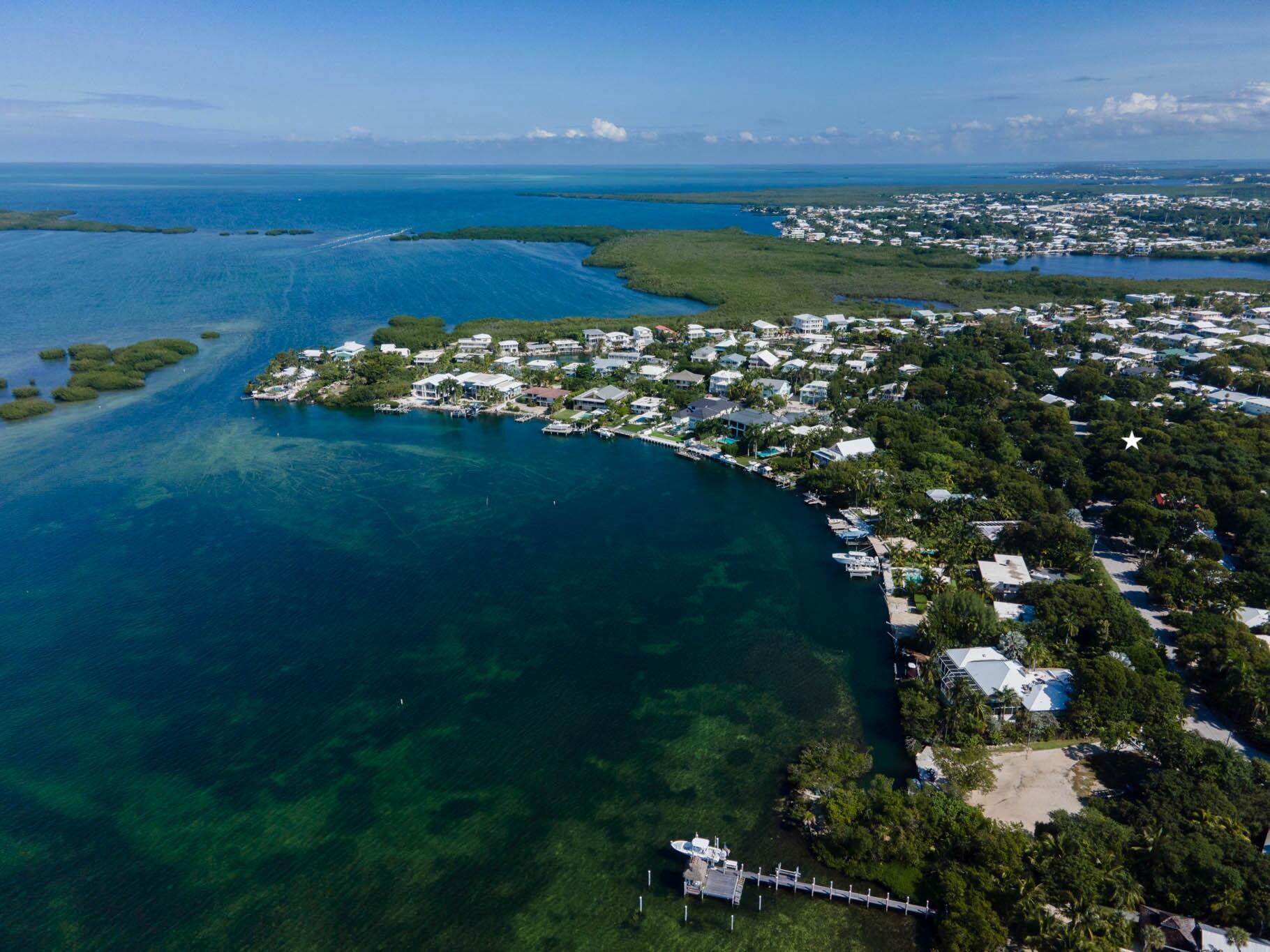 150 Apache Street Tavernier, FL 33070 - Photo 22 of 32 a view of a lake