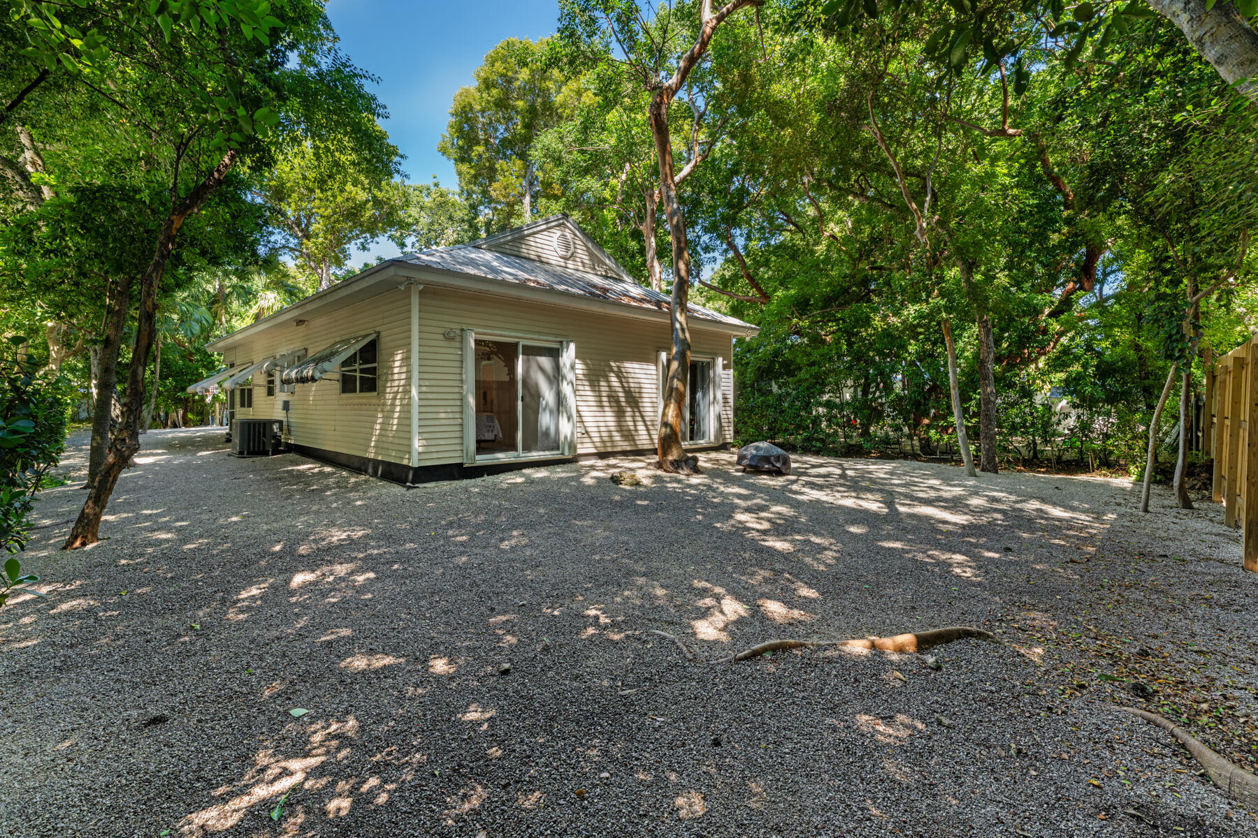 150 Apache Street Tavernier, FL 33070 - Photo 25 of 32 a view of a house with a yard