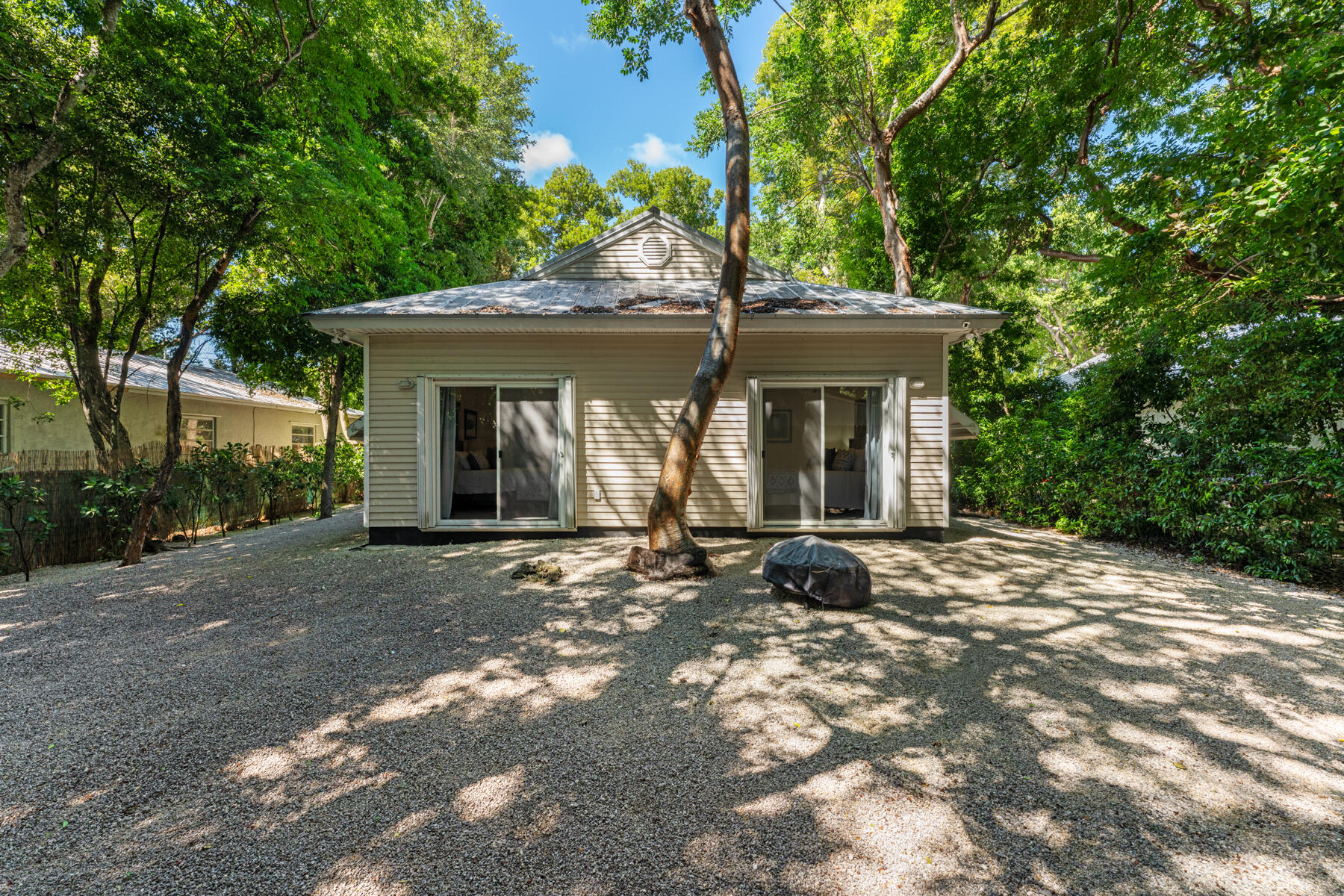 150 Apache Street Tavernier, FL 33070 - Photo 26 of 32 a view of a house with backyard and garden