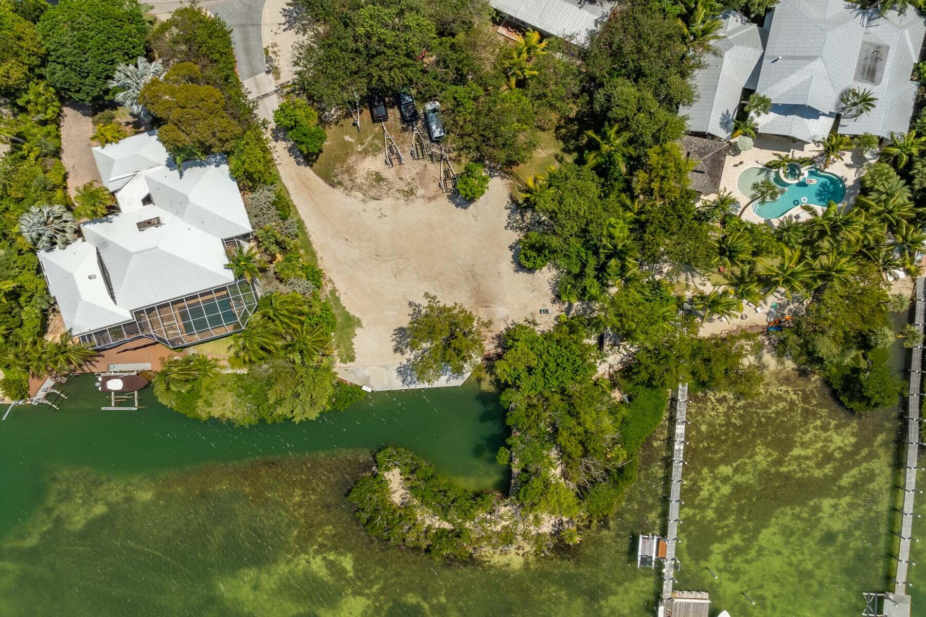 150 Apache Street Tavernier, FL 33070 - Photo 27 of 32 an aerial view of residential house with an outdoor space