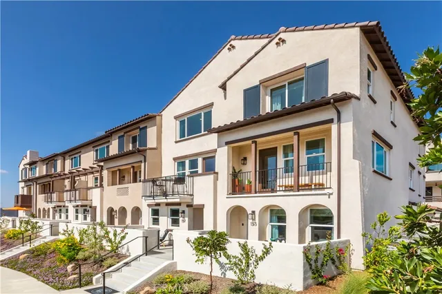 a front view of a building with a lot of windows