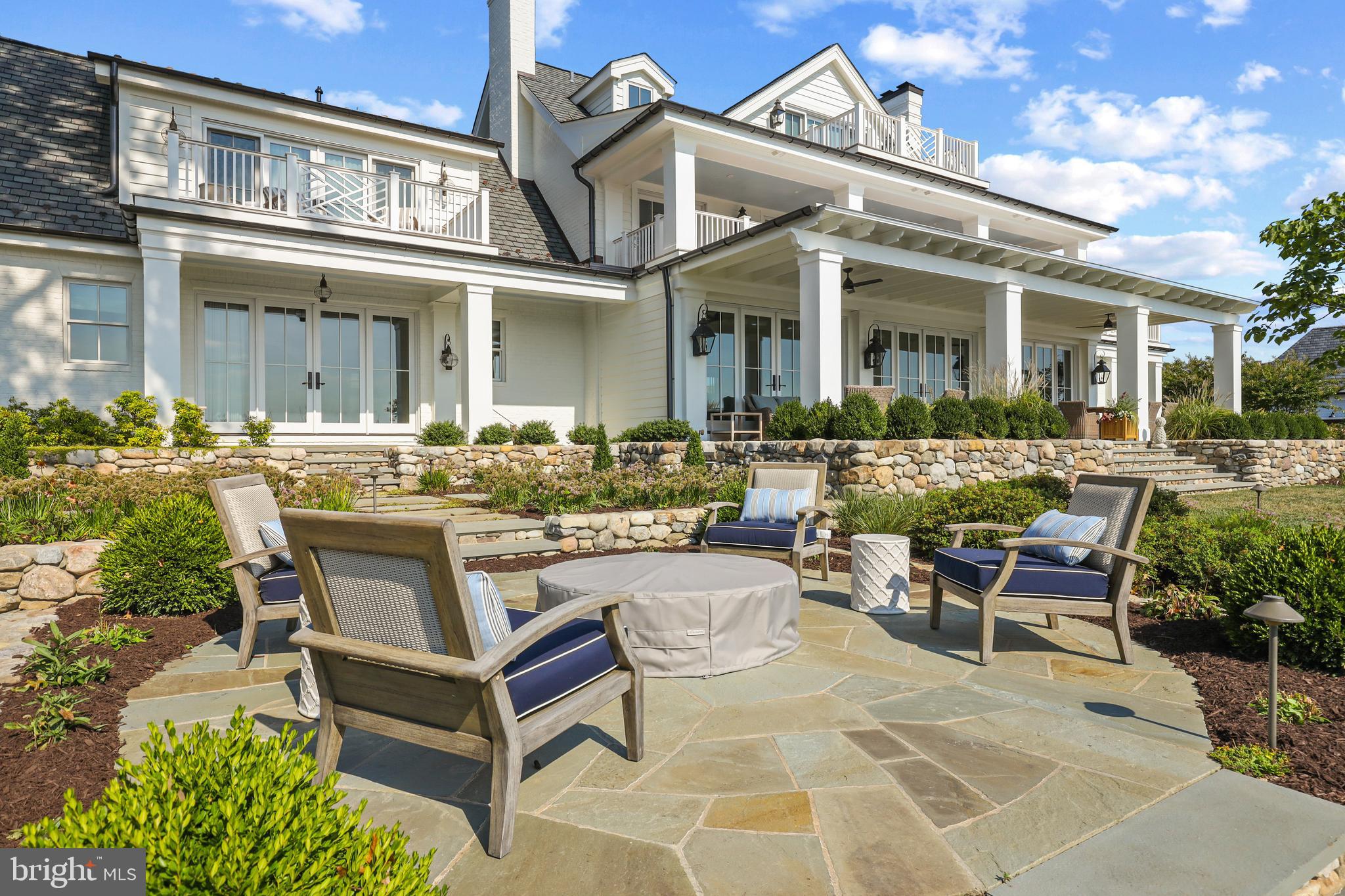 3200 Arundel On The Bay Road Annapolis, MD 21403 - Photo 19 of 110 Blue stone fire pit area with gas line and remote