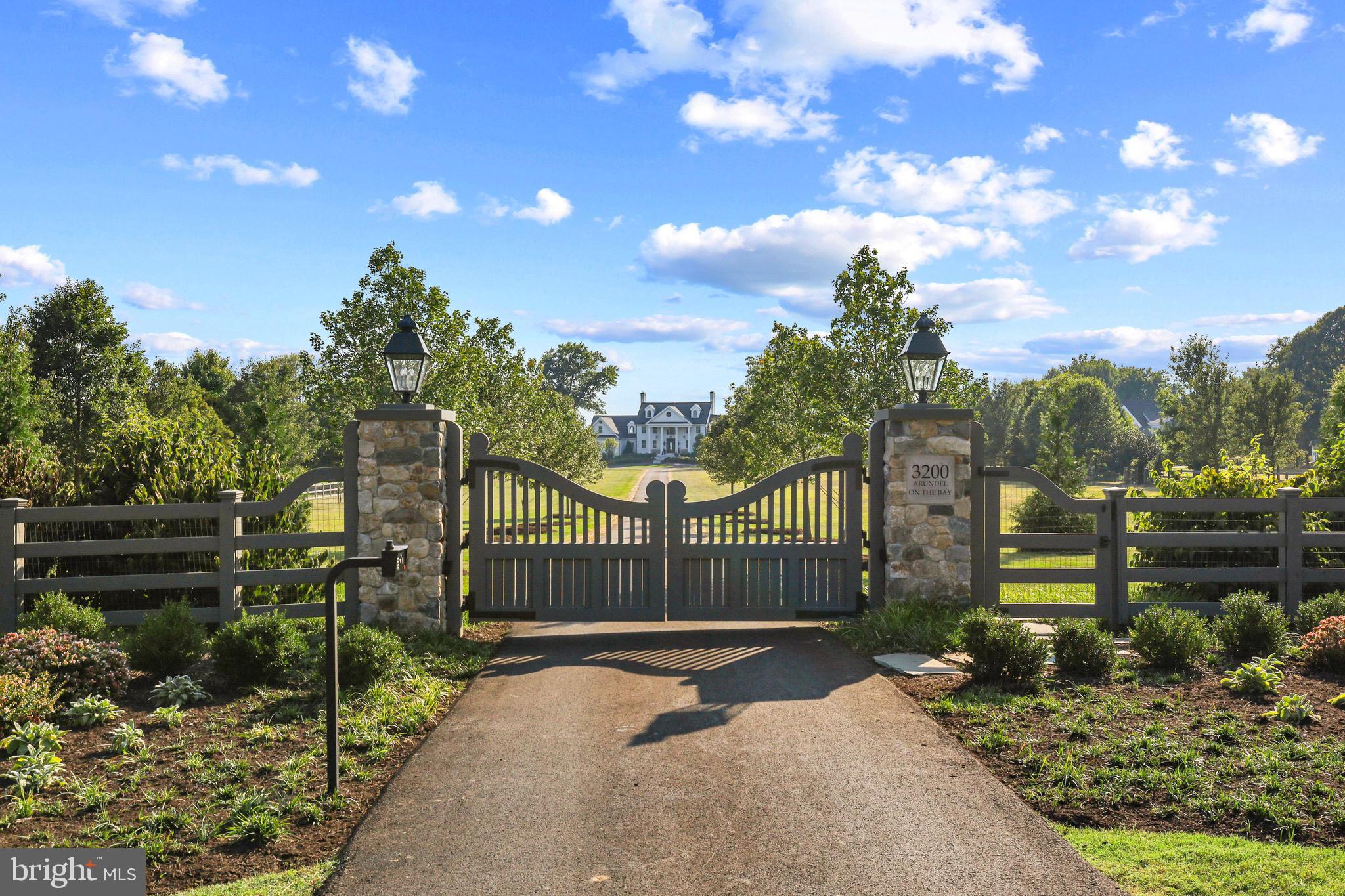 3200 Arundel On The Bay Road Annapolis, MD 21403 - Photo 2 of 110 Custom mahogany & fieldstone secure gate