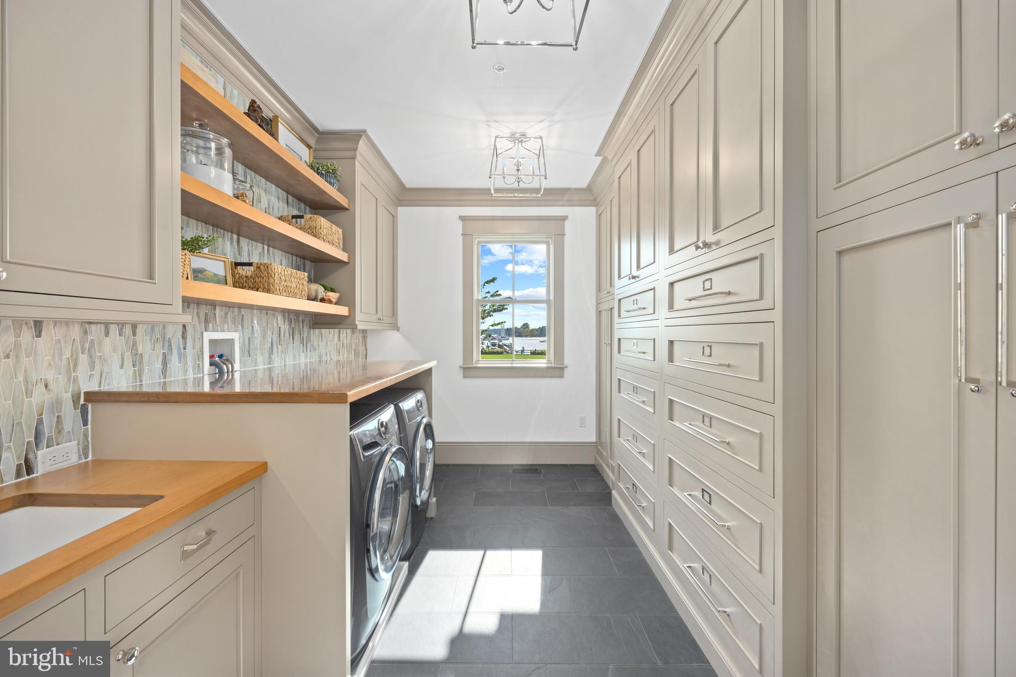 3200 Arundel On The Bay Road Annapolis, MD 21403 - Photo 50 of 110 Laundry #1 with sink & extensive custom storage