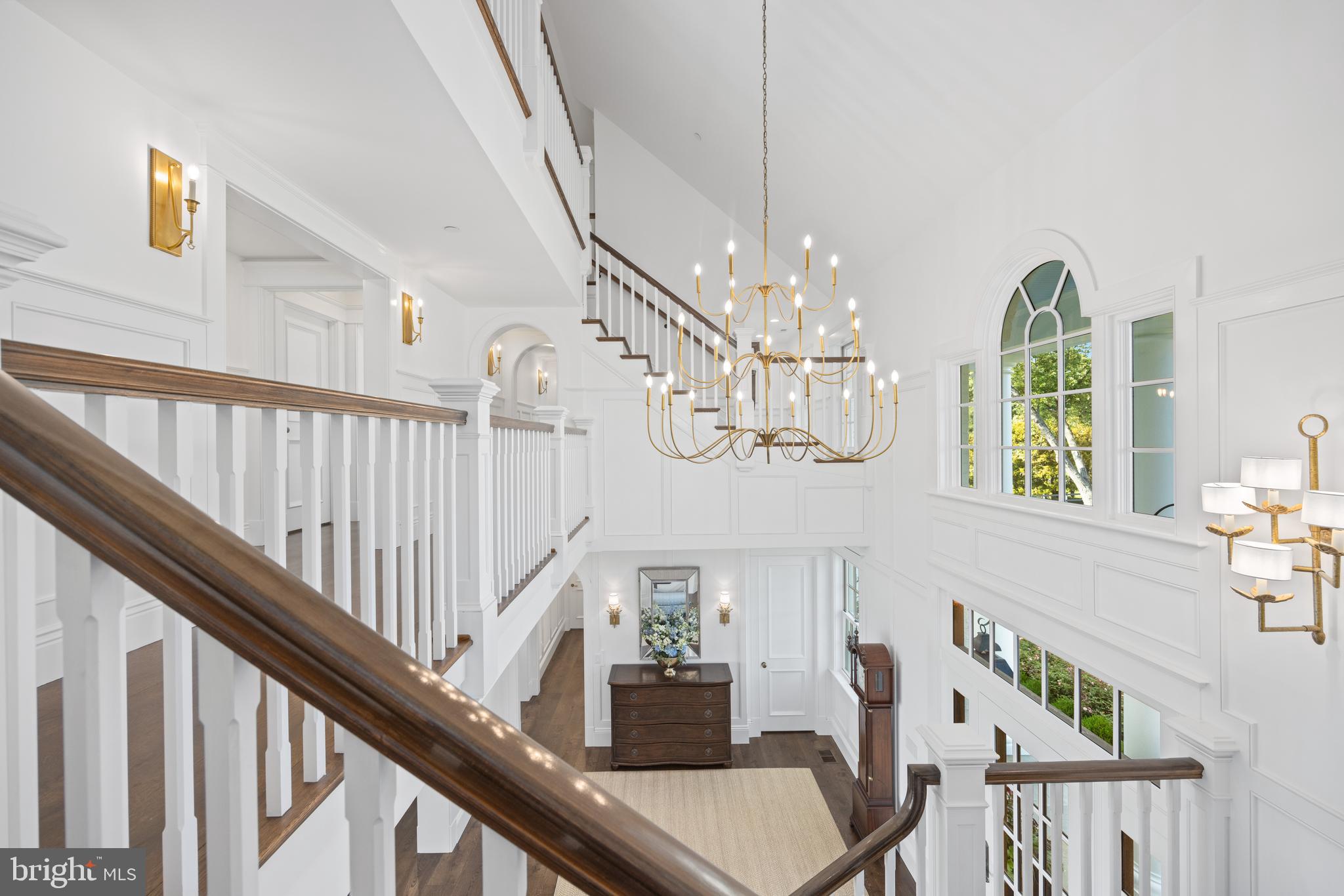 3200 Arundel On The Bay Road Annapolis, MD 21403 - Photo 61 of 110 Dramatic staircases lead to second & third levels