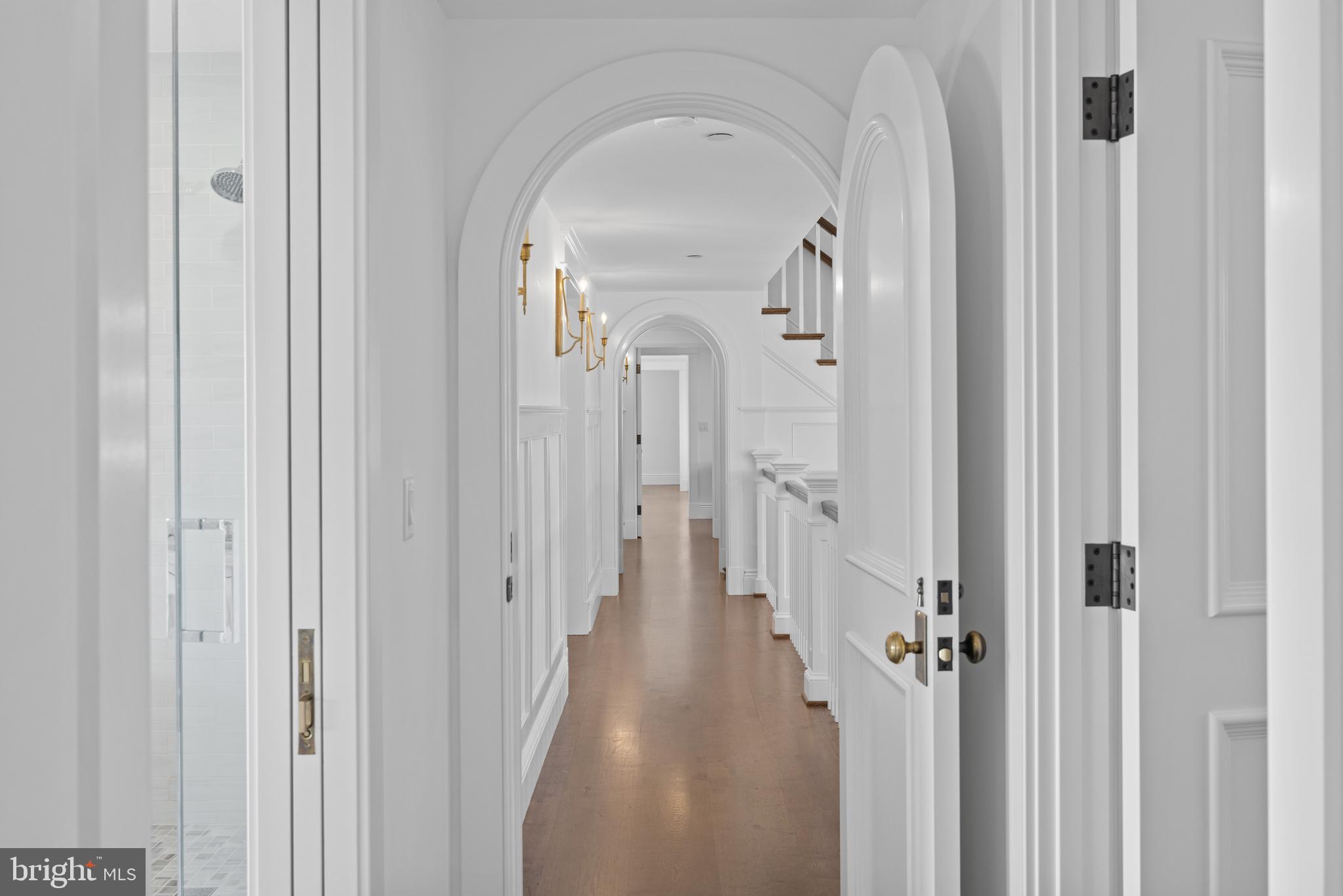 3200 Arundel On The Bay Road Annapolis, MD 21403 - Photo 62 of 110 Elegant arched doorways and wall sconces