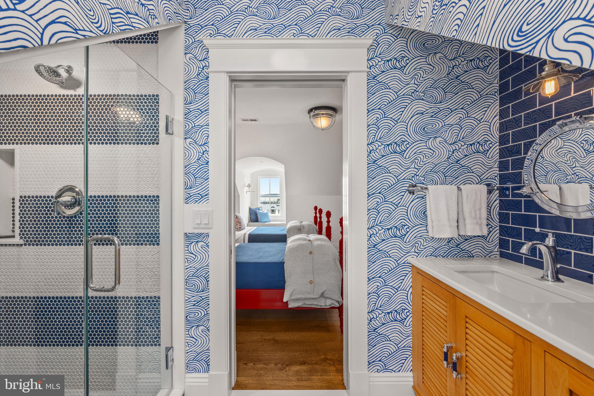 3200 Arundel On The Bay Road Annapolis, MD 21403 - Photo 88 of 110 Penny tile accents and custom wallpaper