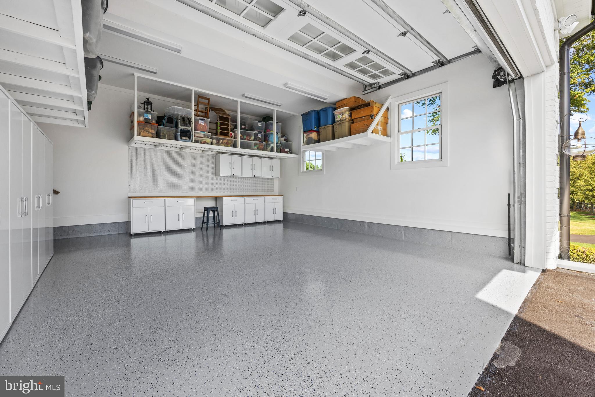 3200 Arundel On The Bay Road Annapolis, MD 21403 - Photo 91 of 110 2-car garage with newly epoxied floor & storage