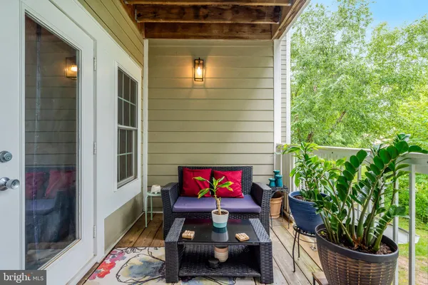 a view of a porch with furniture