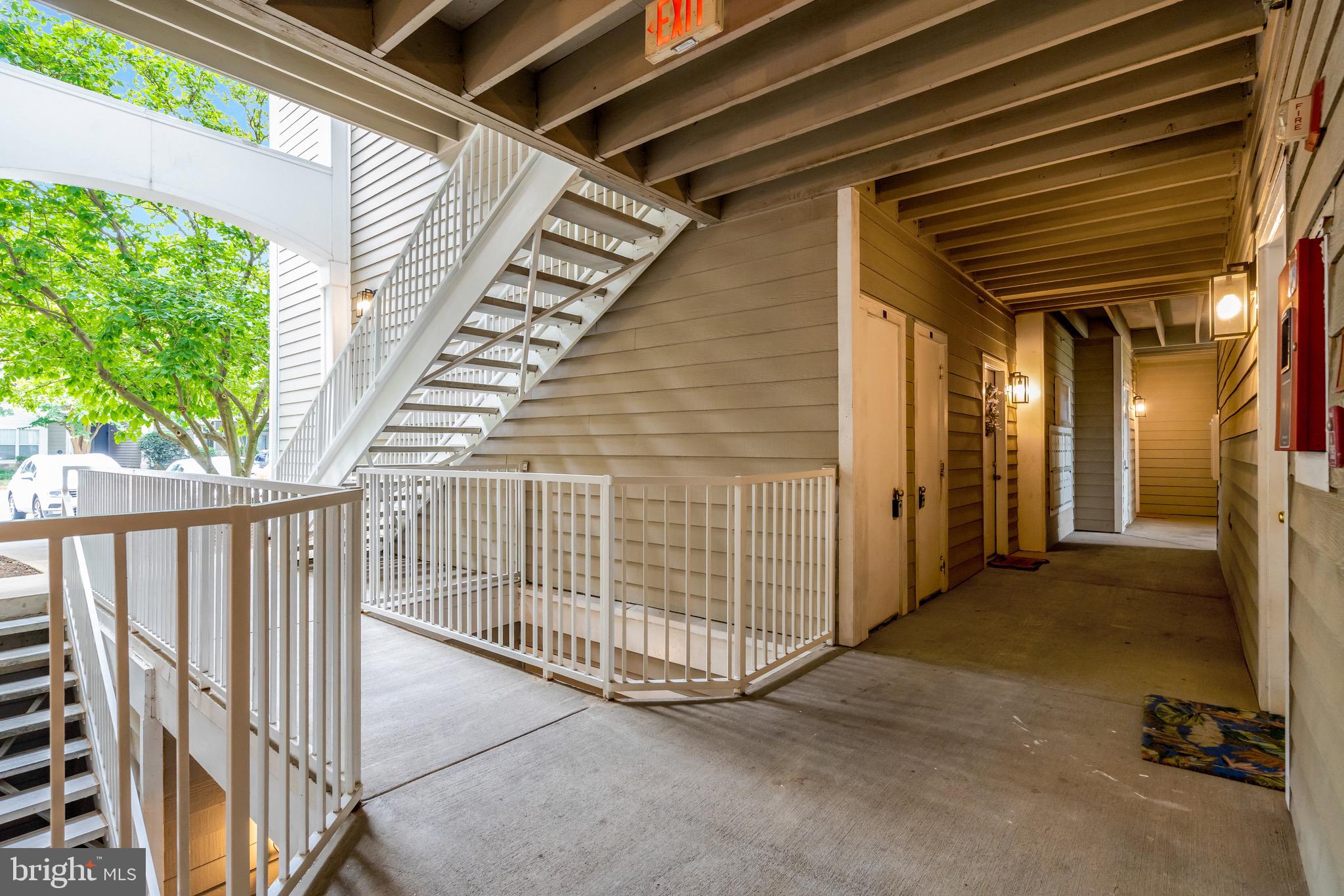 1712 Lake Shore Crest Drive, Unit 14 Reston, VA 20190 - Photo 20 of 24 a view of a porch with furniture