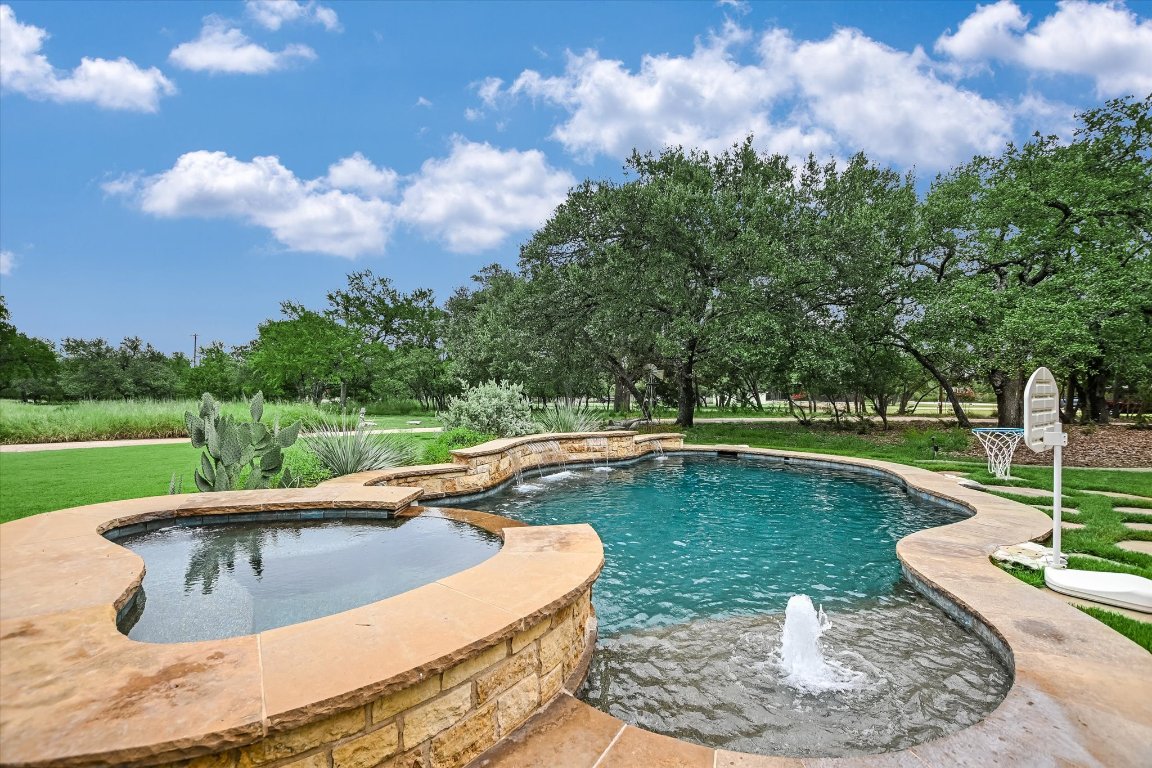425 Patricia Road Georgetown, TX 78628 - Photo 25 of 30 a view of a swimming pool with a yard