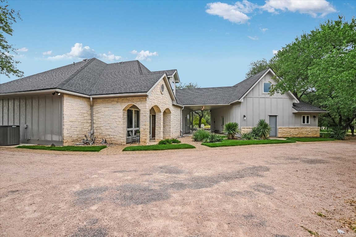 425 Patricia Road Georgetown, TX 78628 - Photo 28 of 30 a front view of a house with a yard and garage