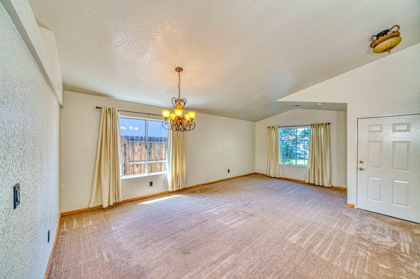 1228 Meadow Lane Tracy, CA 95377 - Photo 15 of 40 an empty room with windows