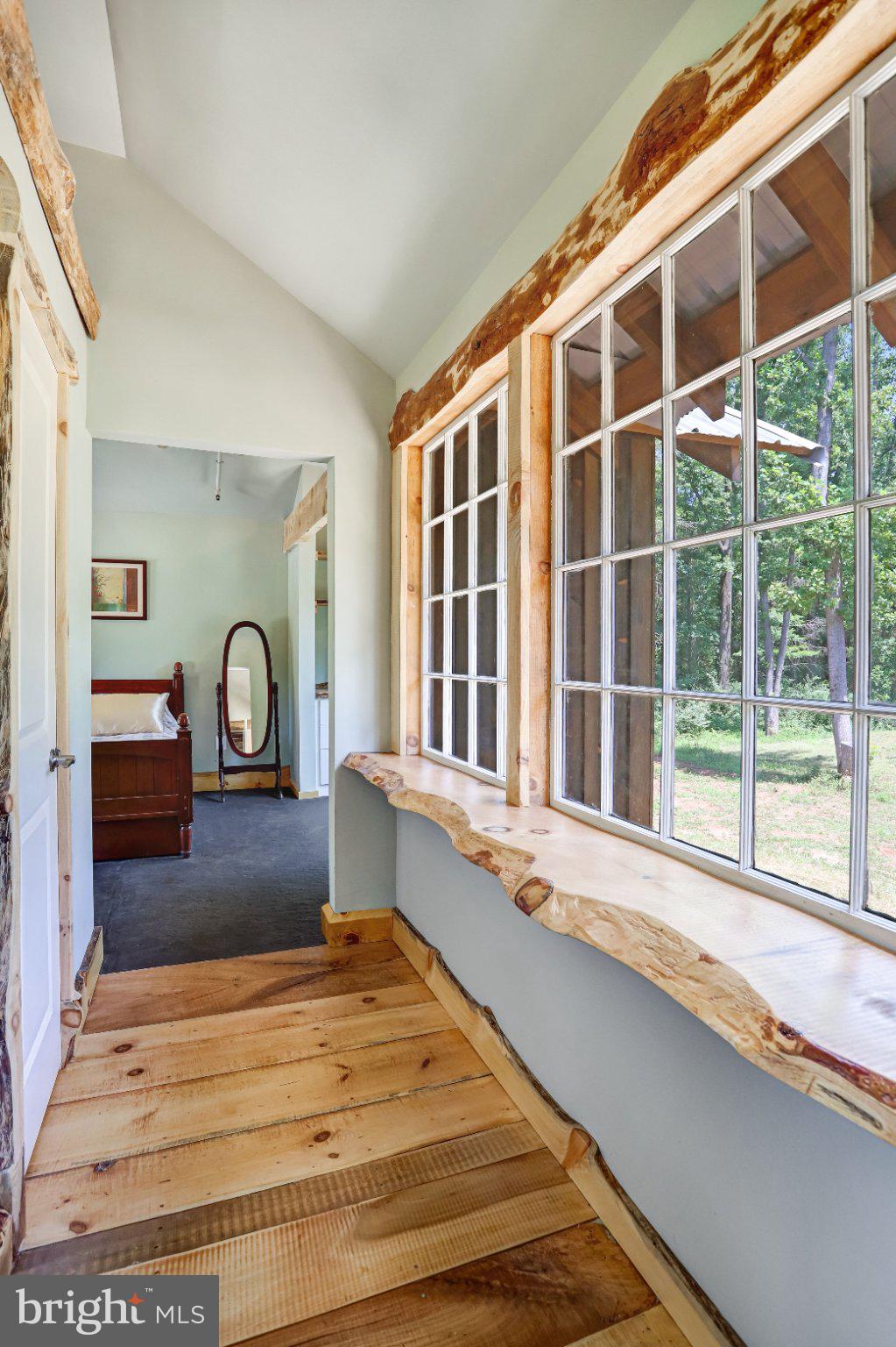 14915 Mount Nebo Road Poolesville, MD 20837 - Photo 22 of 38 Sunlit hallway with rustic charm.