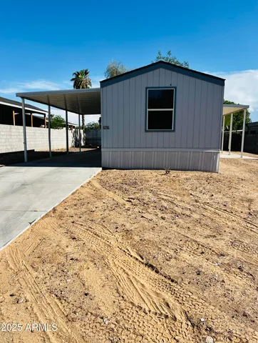 a stove top oven sitting inside of a kitchen