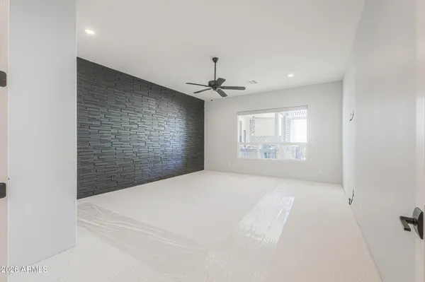 a close view of utility and utility room with washer and dryer