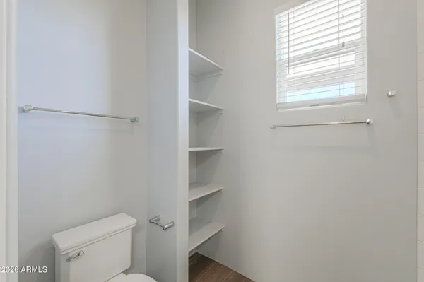 an aerial view of a house with a swimming pool