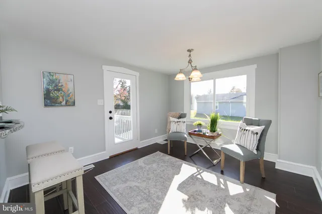 a workspace with furniture and window