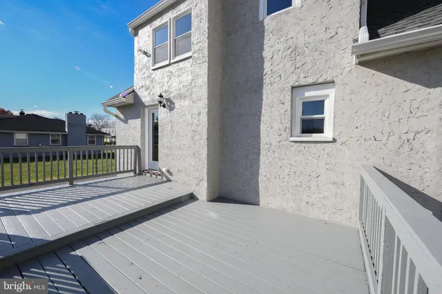 a view of a backyard with a deck