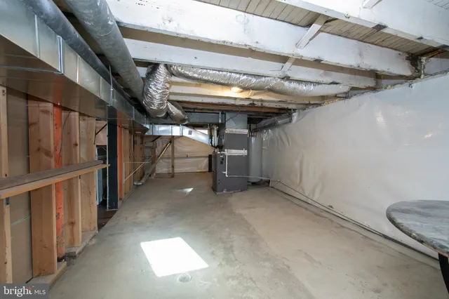 a view of a hallway with stairs