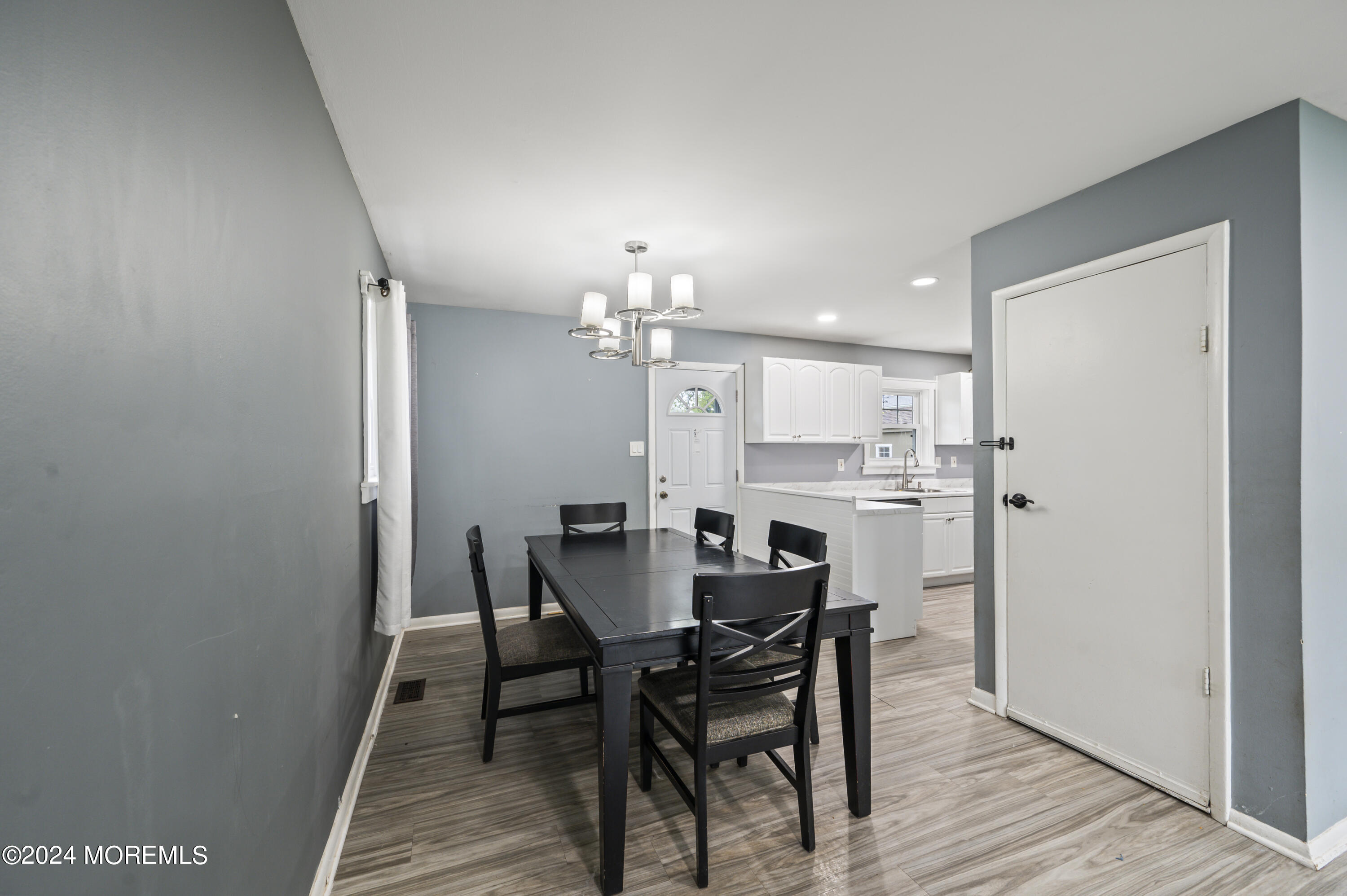 201 Hollowbrook Drive Ewing, NJ 08638 - Photo 16 of 44 a view of a dining room with furniture and chandelier