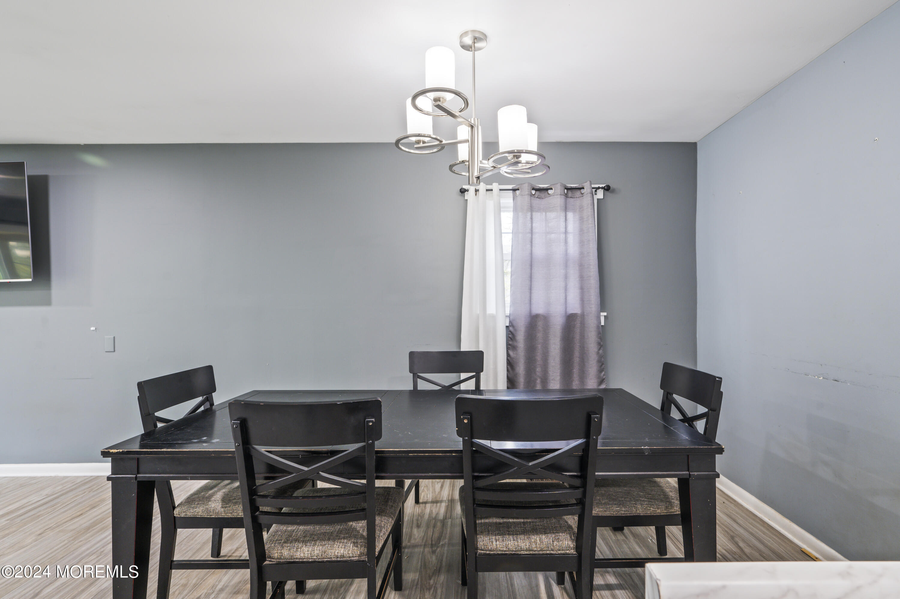 201 Hollowbrook Drive Ewing, NJ 08638 - Photo 17 of 44 a view of a dining room with furniture and chandelier