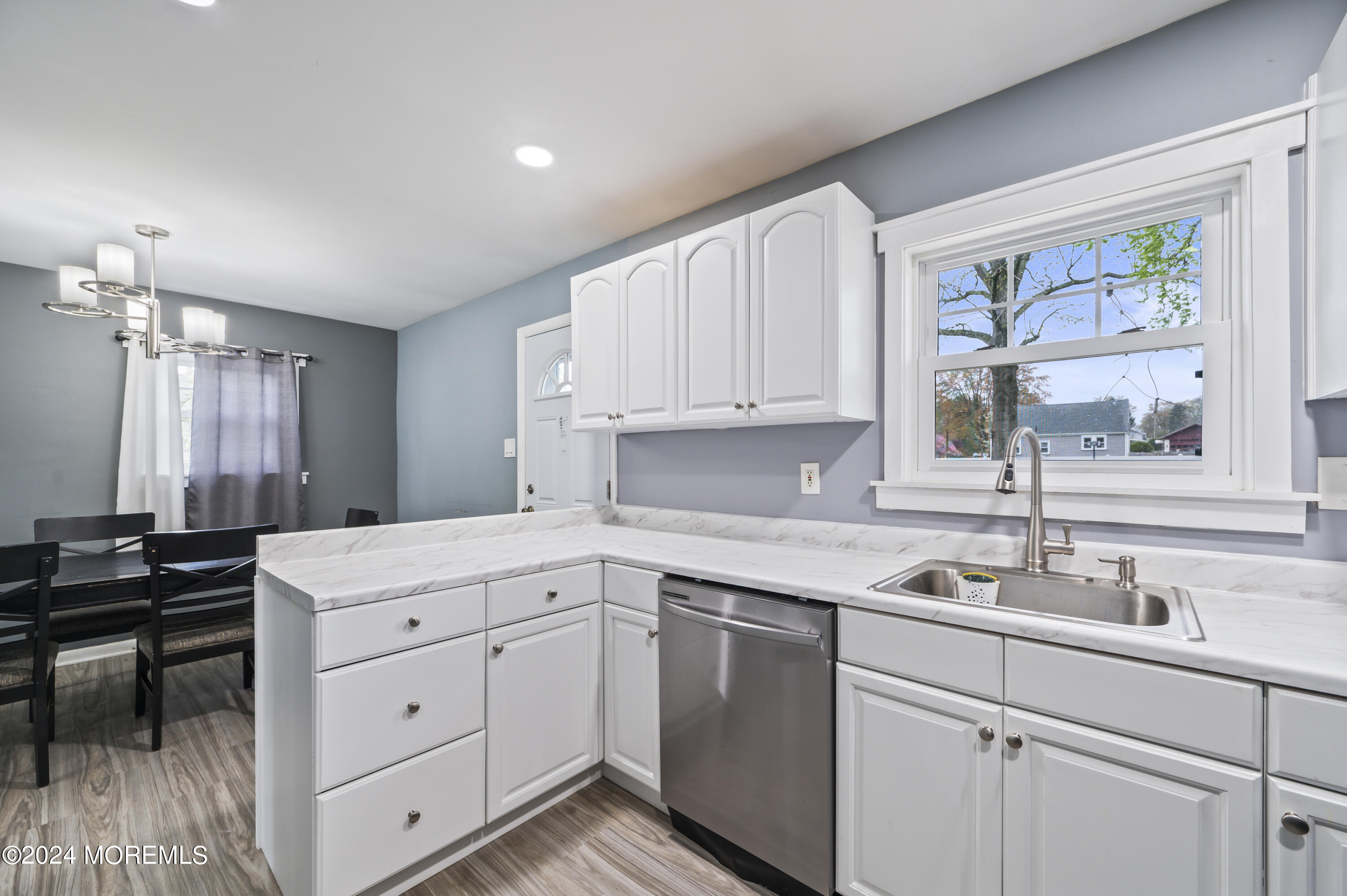 201 Hollowbrook Drive Ewing, NJ 08638 - Photo 18 of 44 a kitchen with a sink cabinets and window