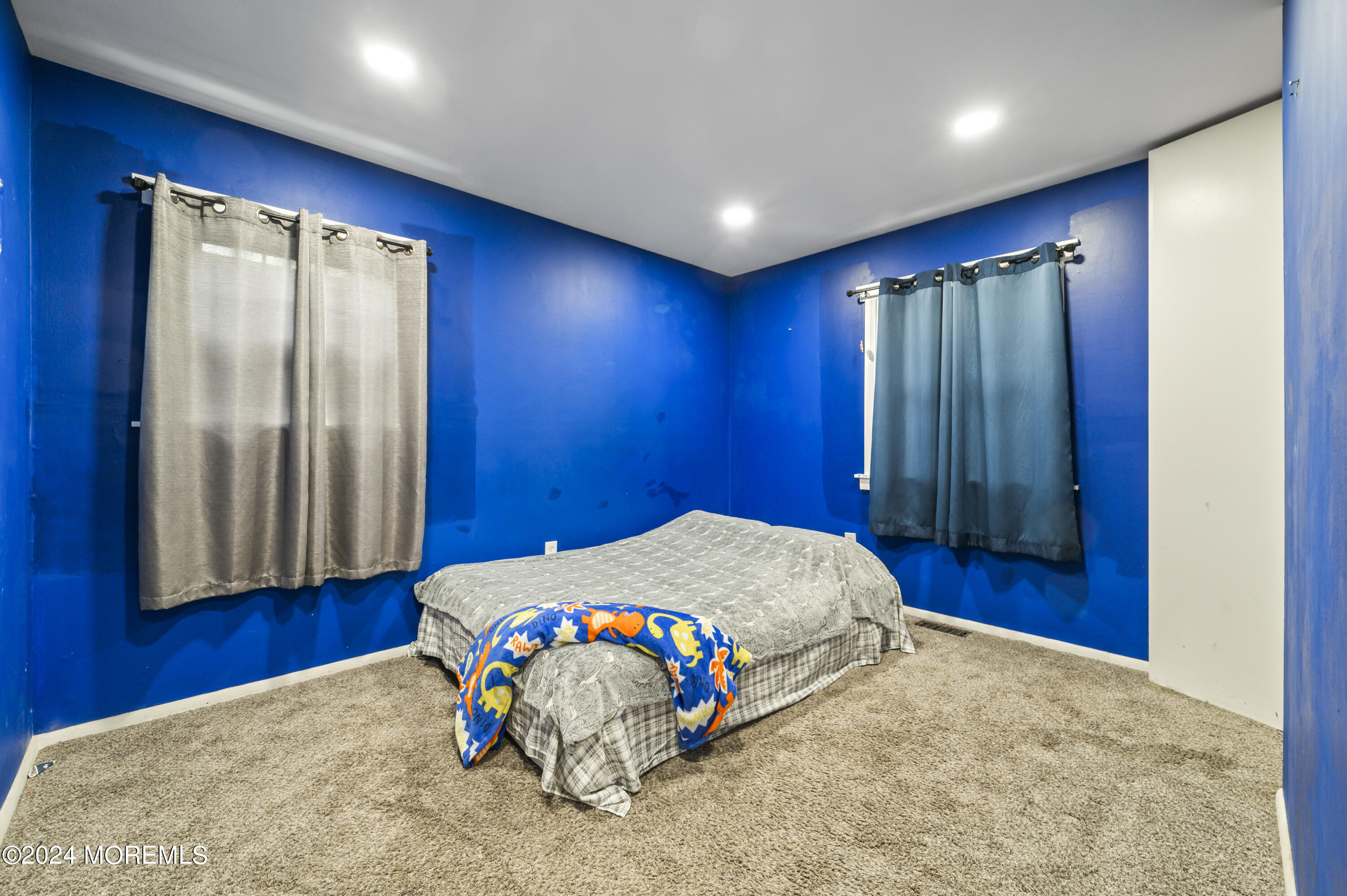 201 Hollowbrook Drive Ewing, NJ 08638 - Photo 20 of 44 a bedroom with a bed and a mirror