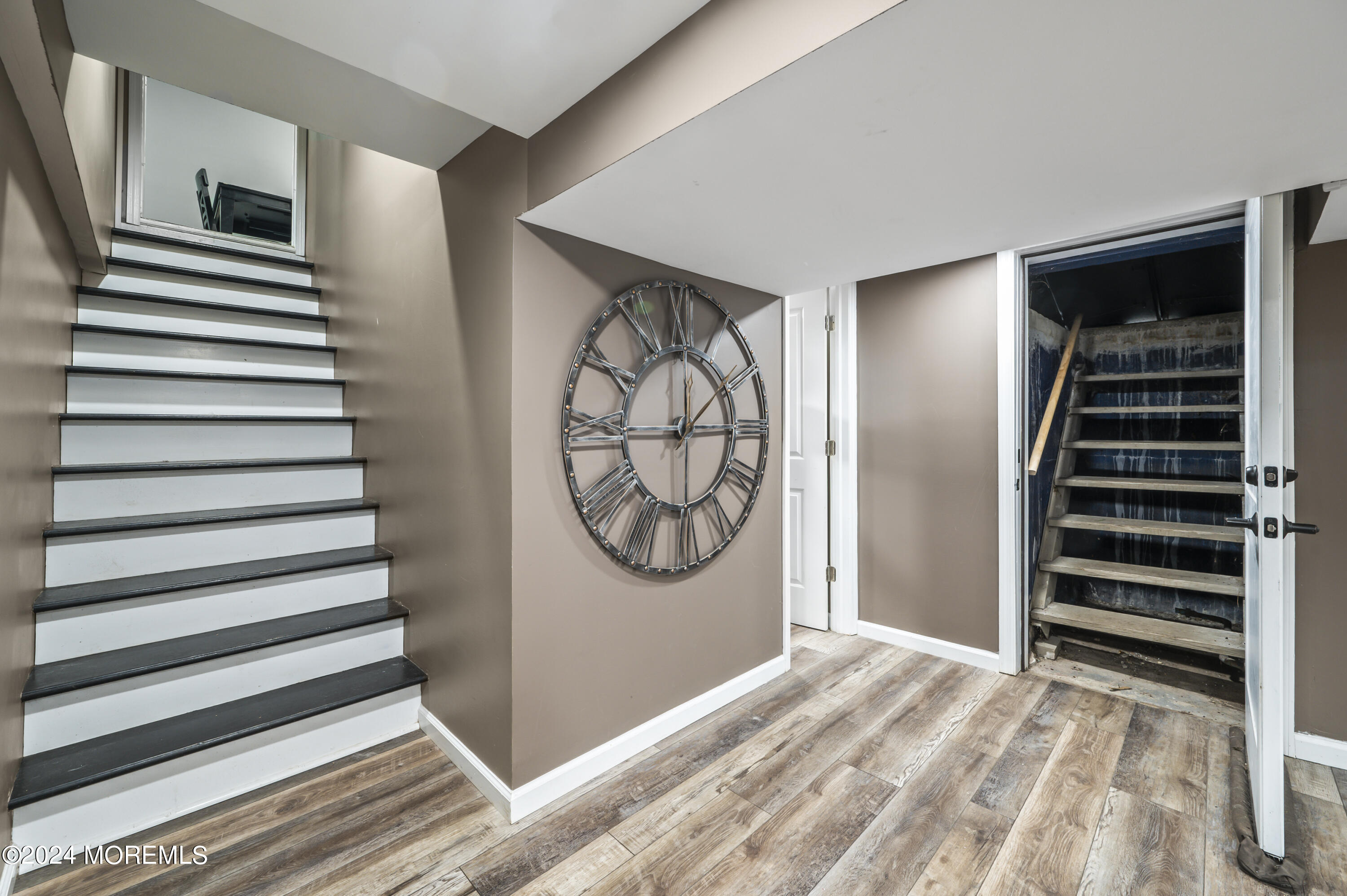 201 Hollowbrook Drive Ewing, NJ 08638 - Photo 25 of 44 a view of a livingroom with wooden floor and stairs