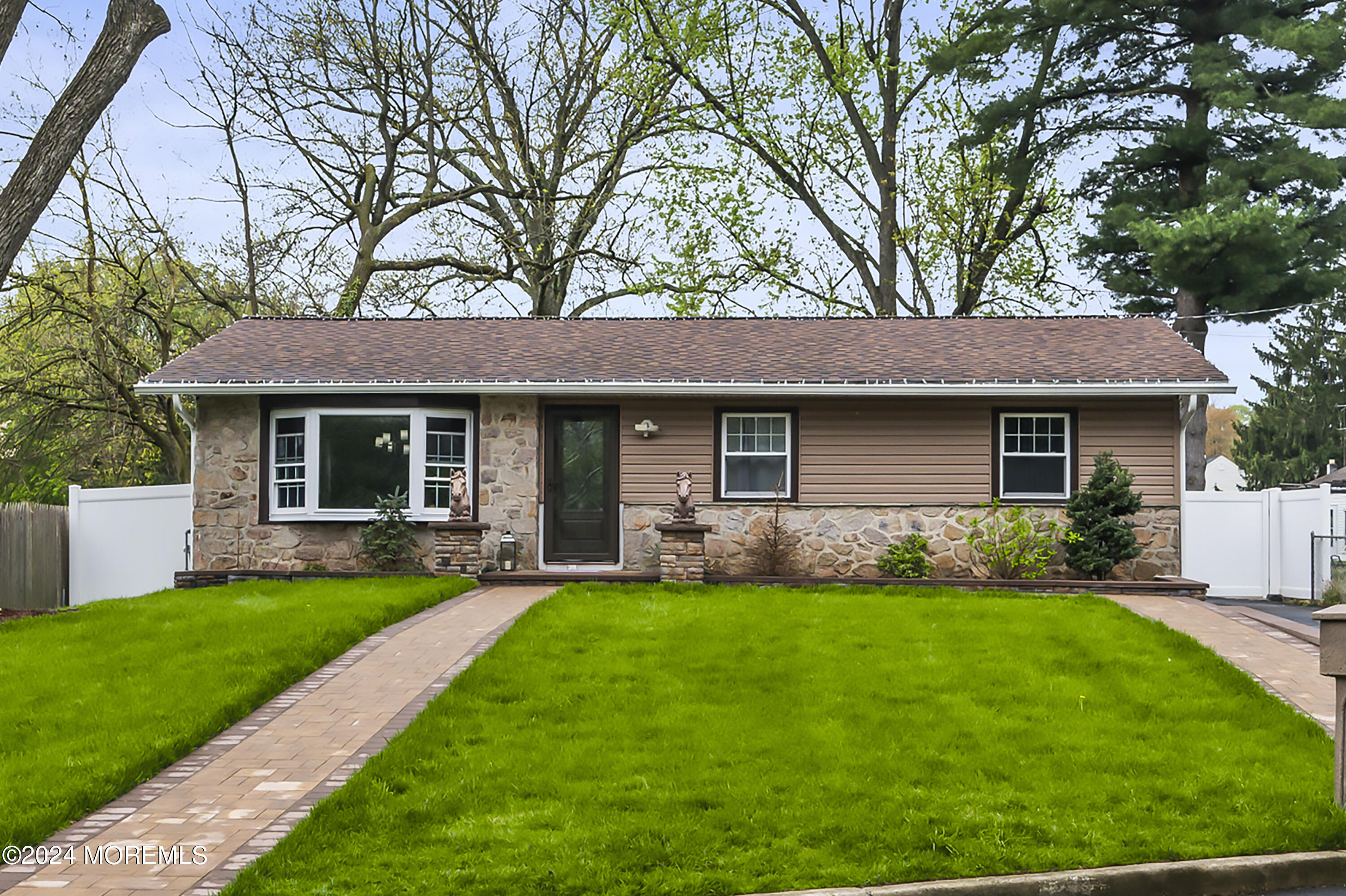 201 Hollowbrook Drive Ewing, NJ 08638 - Photo 3 of 44 a view of a yard in front of a house