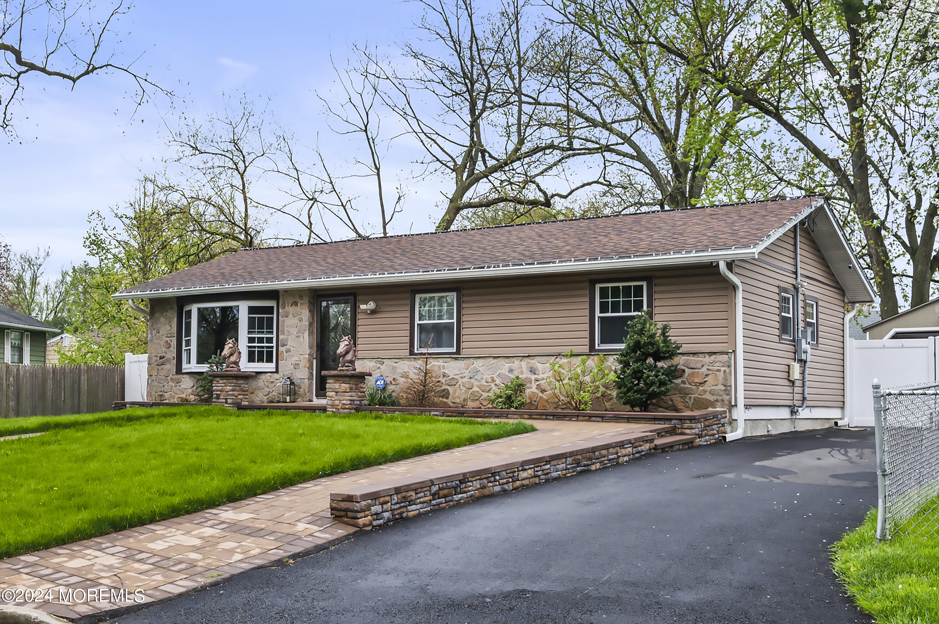 201 Hollowbrook Drive Ewing, NJ 08638 - Photo 4 of 44 a front view of house with yard and green space