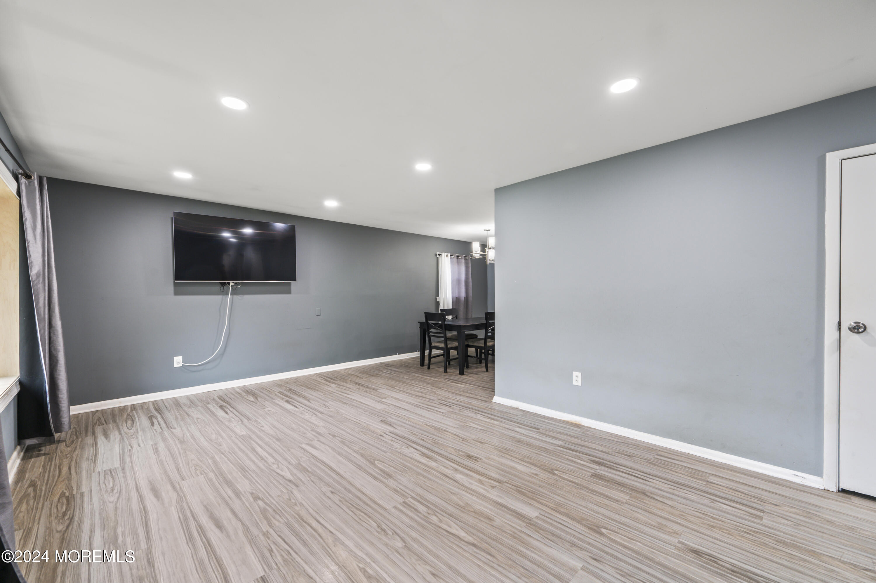 201 Hollowbrook Drive Ewing, NJ 08638 - Photo 8 of 44 a view of a livingroom with a flat screen tv