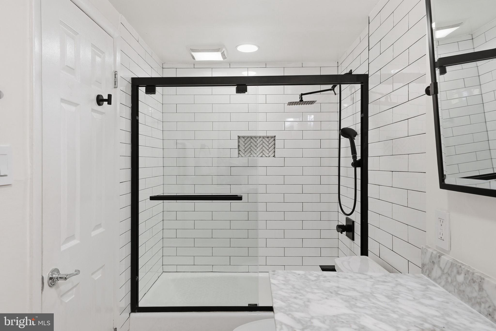 1200 East Capitol Street Northeast, Unit 1 Washington, DC 20002 - Photo 27 of 31 a bathroom with a shower