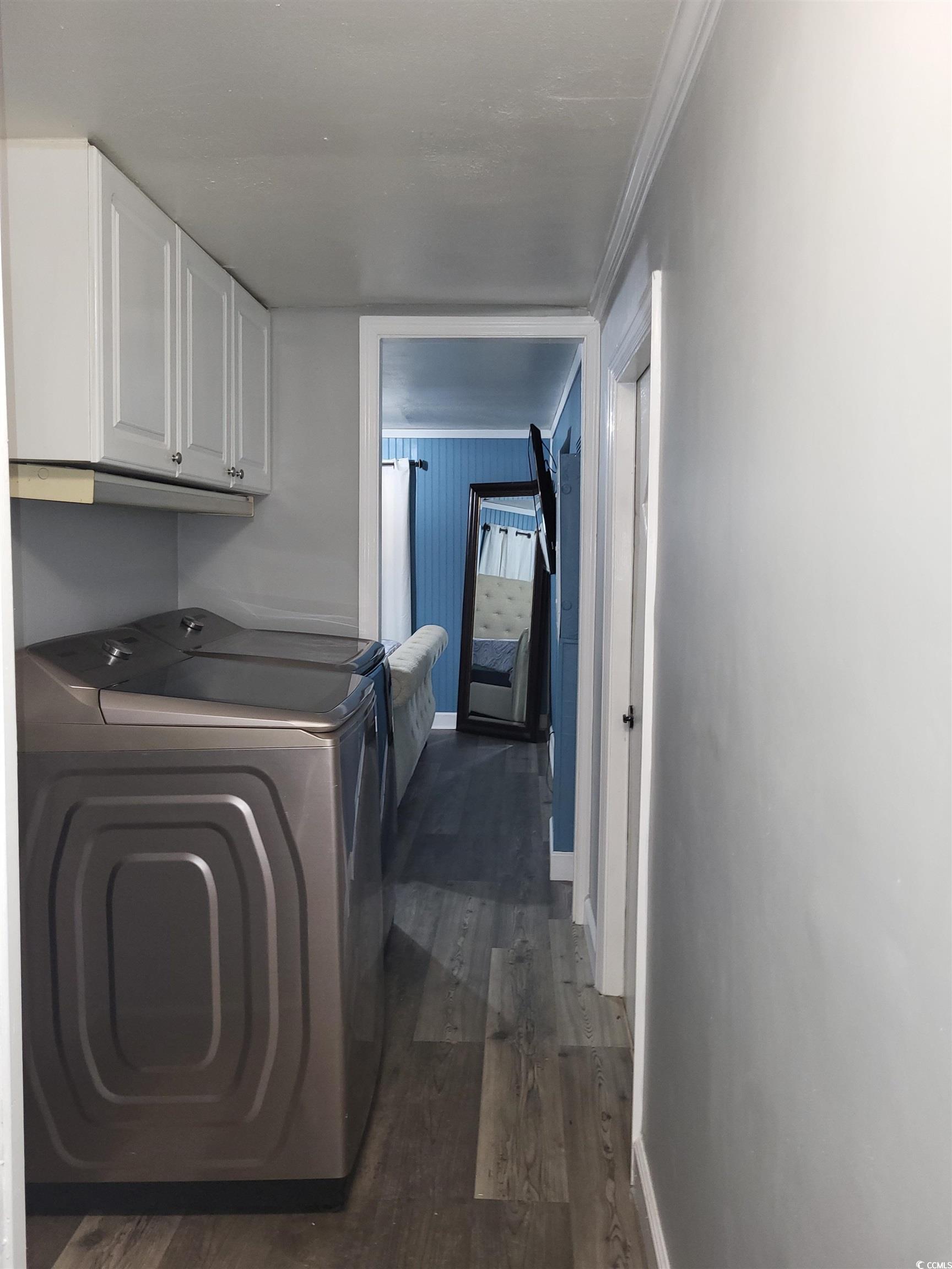 180 Offshore Drive Murrells Inlet, SC 29576 - Photo 14 of 23 Washroom with crown molding, dark hardwood / wood-