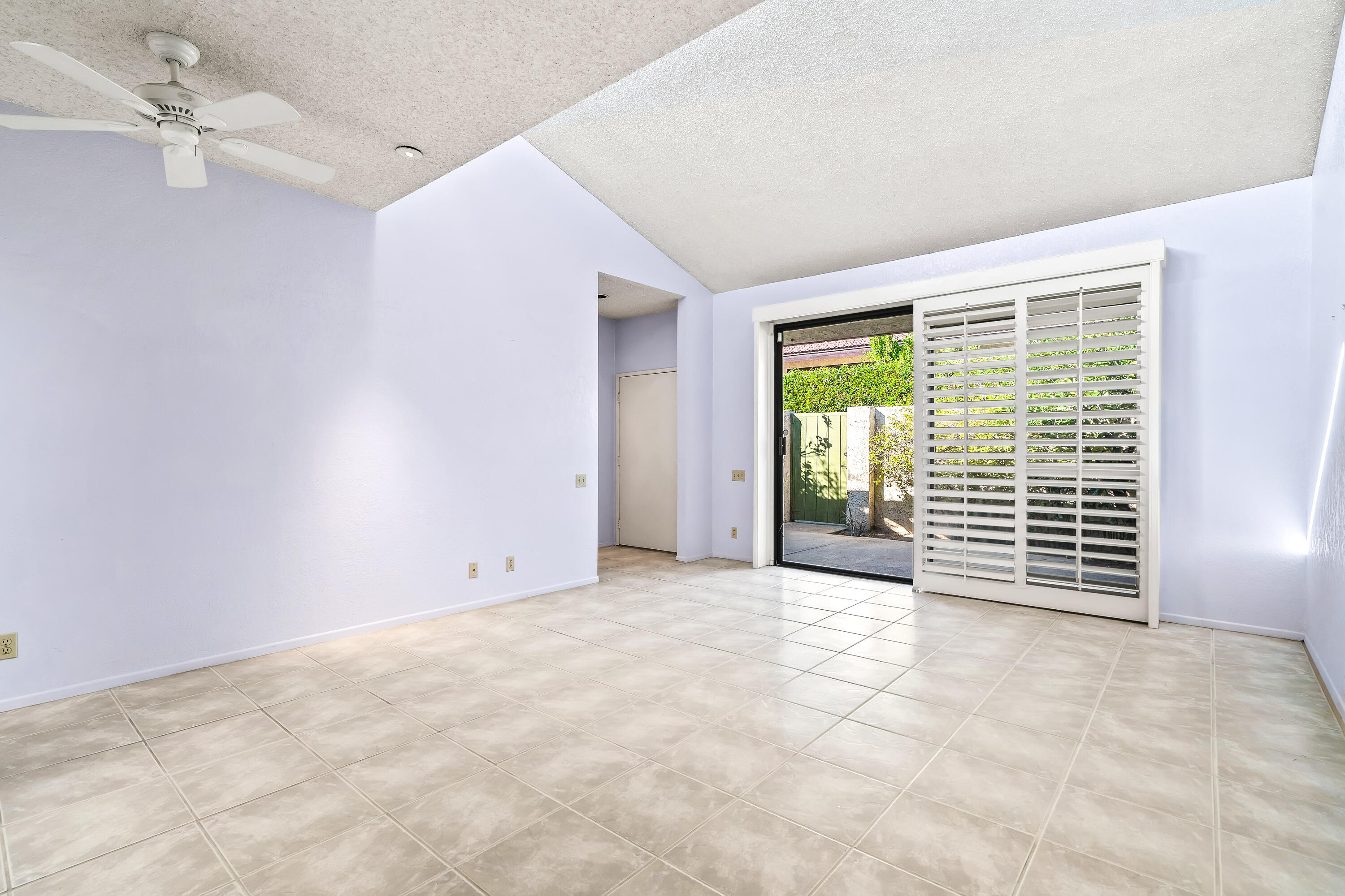 1384 East Andreas Road Palm Springs, CA 92262 - Photo 11 of 46 an empty room with windows