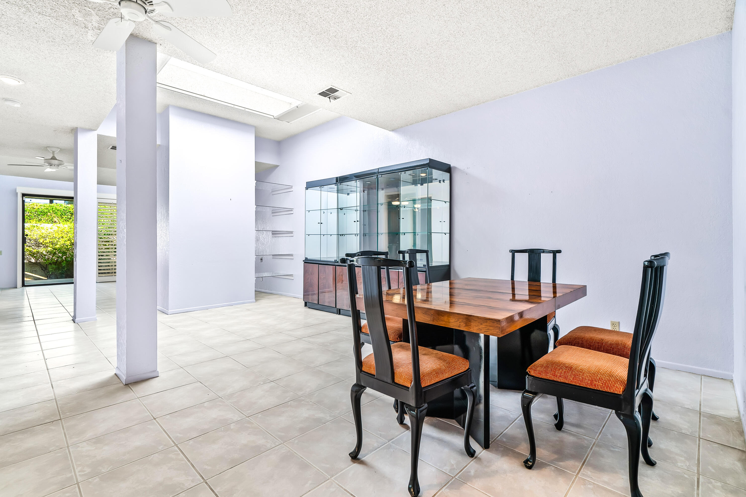 1384 East Andreas Road Palm Springs, CA 92262 - Photo 16 of 46 a dining room with furniture and window