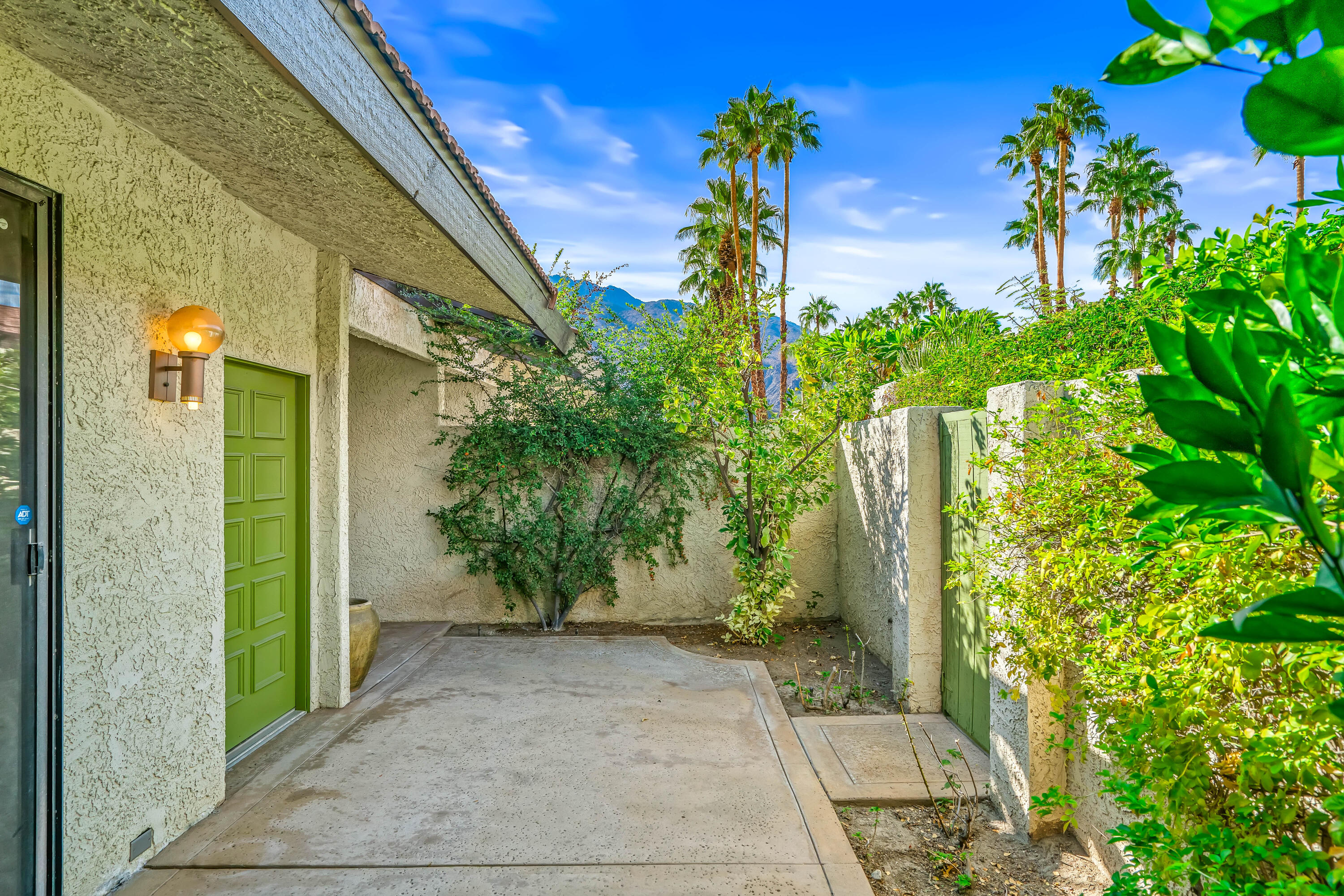 1384 East Andreas Road Palm Springs, CA 92262 - Photo 2 of 46 a view of a garden with pathway