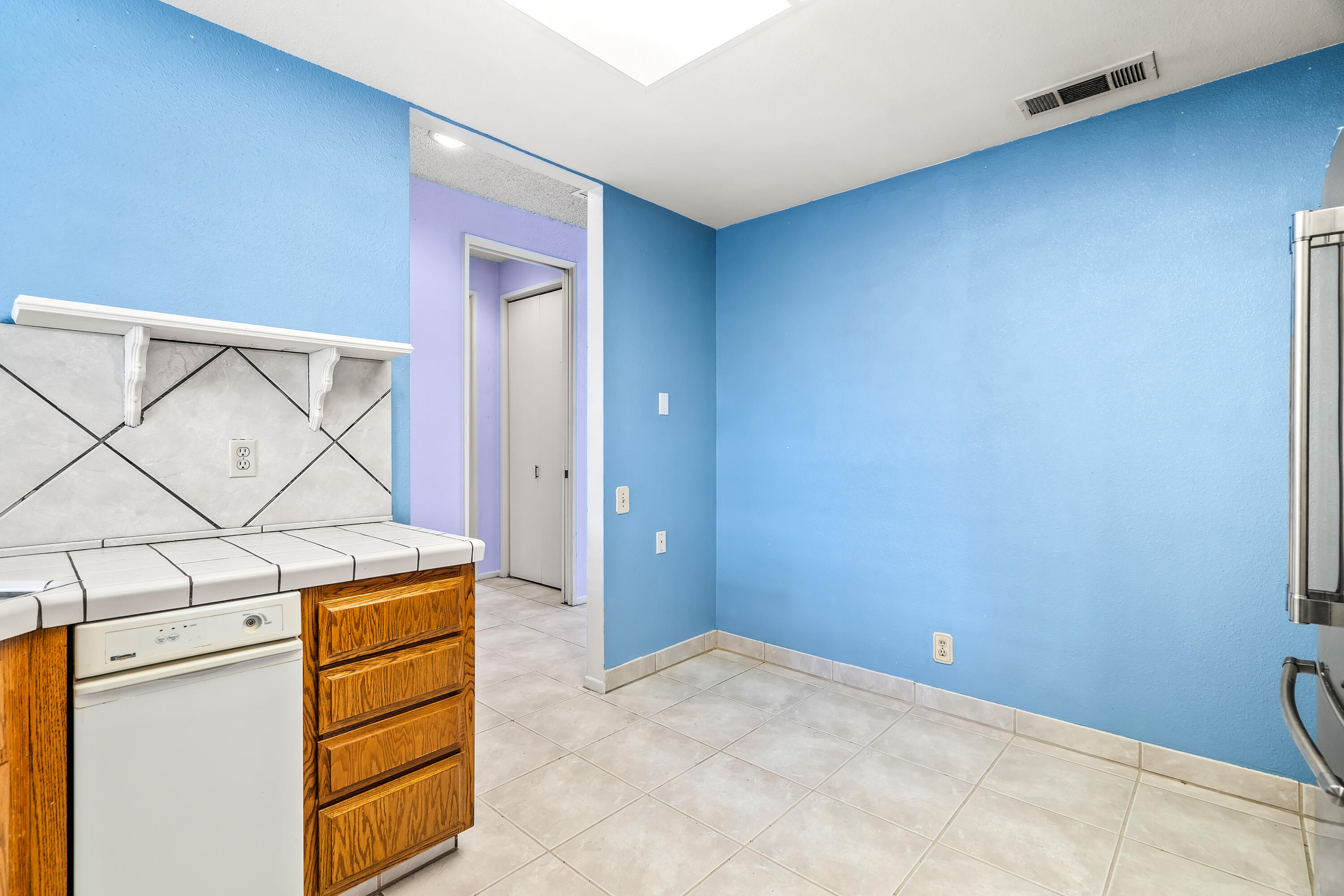 1384 East Andreas Road Palm Springs, CA 92262 - Photo 21 of 46 a view of storage and utility room with washer and dryer