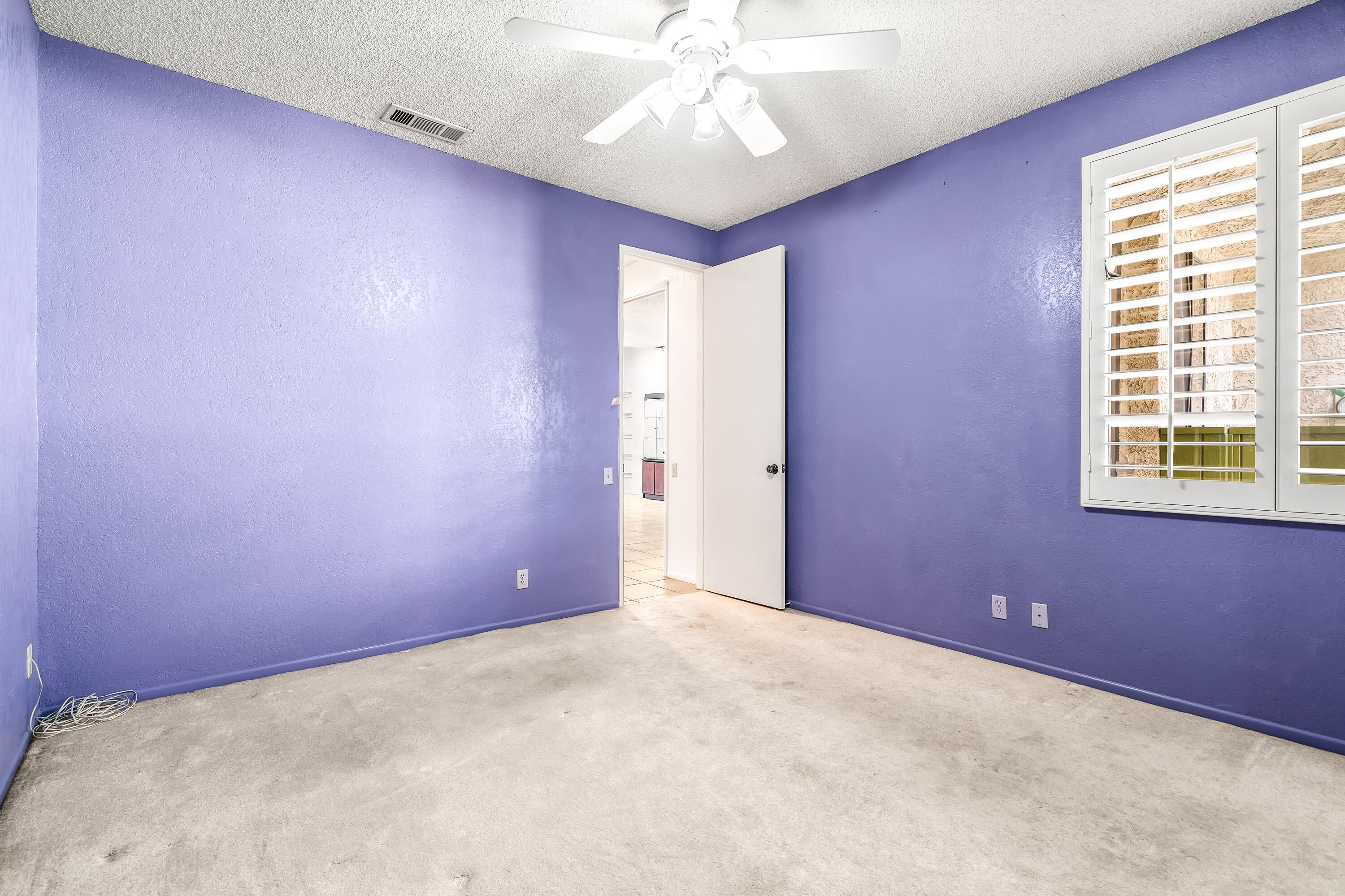 1384 East Andreas Road Palm Springs, CA 92262 - Photo 25 of 46 a view of an empty room with a window