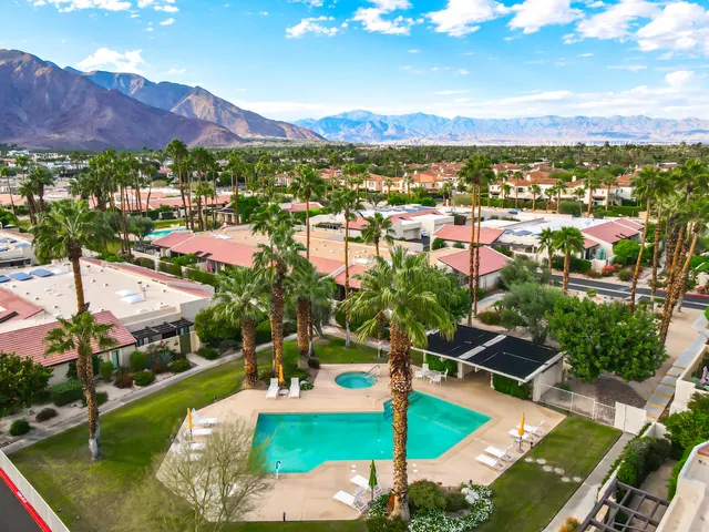 a view of a city with a lake