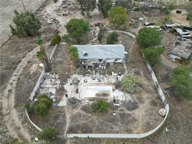 a view of a street with a building in the background