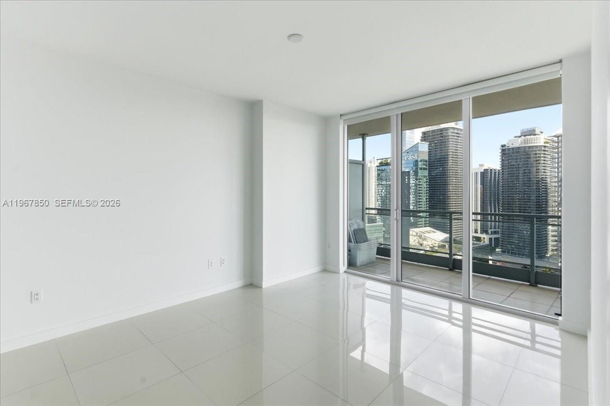 92 Southwest 3rd Street, Unit 3804 Miami, FL 33130 - Photo 14 of 36 a view of an empty room and window