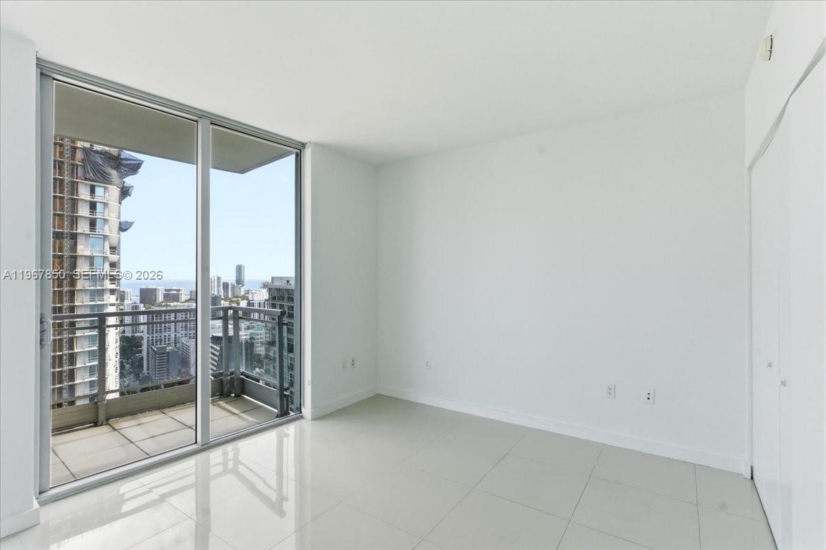 92 Southwest 3rd Street, Unit 3804 Miami, FL 33130 - Photo 23 of 36 a view of a room with window
