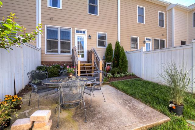 92 Pearl Street Franklin, TN 37064 - Photo 14 of 20 The private courtyard/patio has recently been professionally landscaped. The recently built one-car, alley-loaded garage is located in the rear of the courtyard.