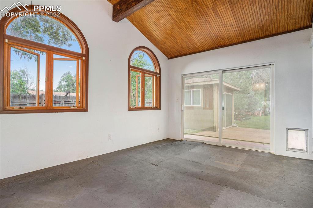 4810 Airport Road Colorado Springs, CO 80916 - Photo 19 of 41 an empty room with windows