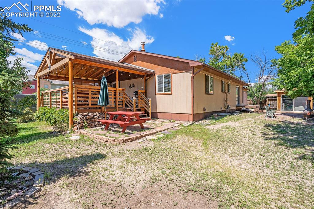 4810 Airport Road Colorado Springs, CO 80916 - Photo 27 of 41 a view of a house with backyard