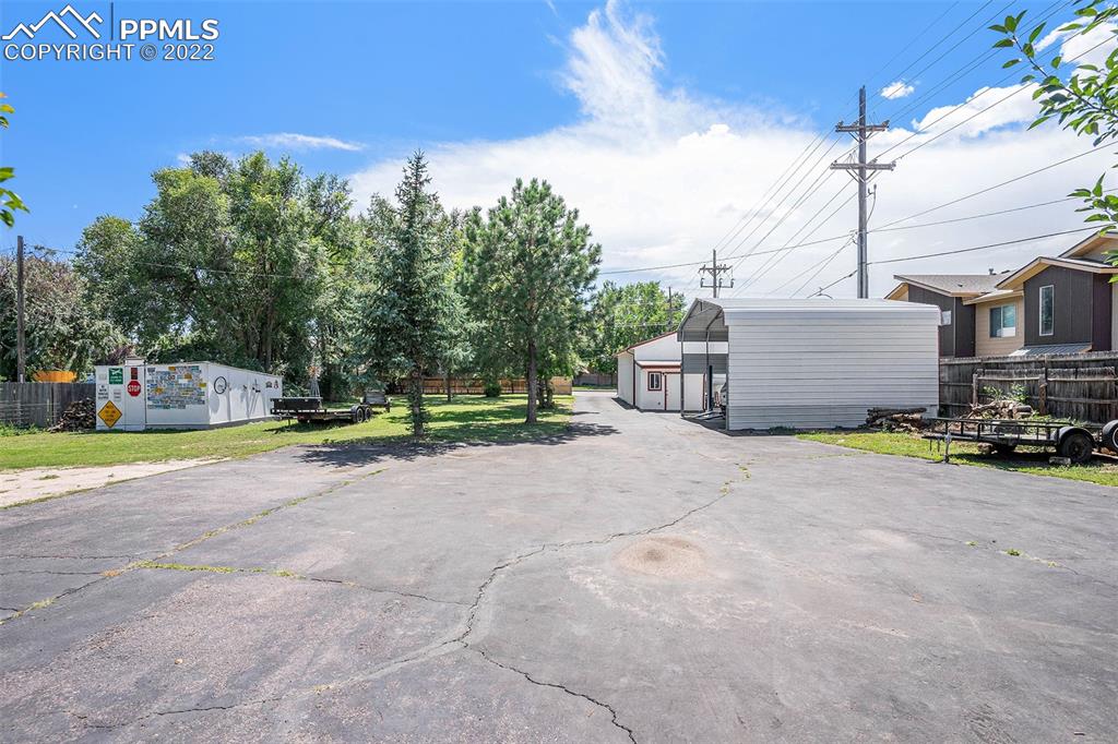4810 Airport Road Colorado Springs, CO 80916 - Photo 30 of 41 a view of a house with basketball court