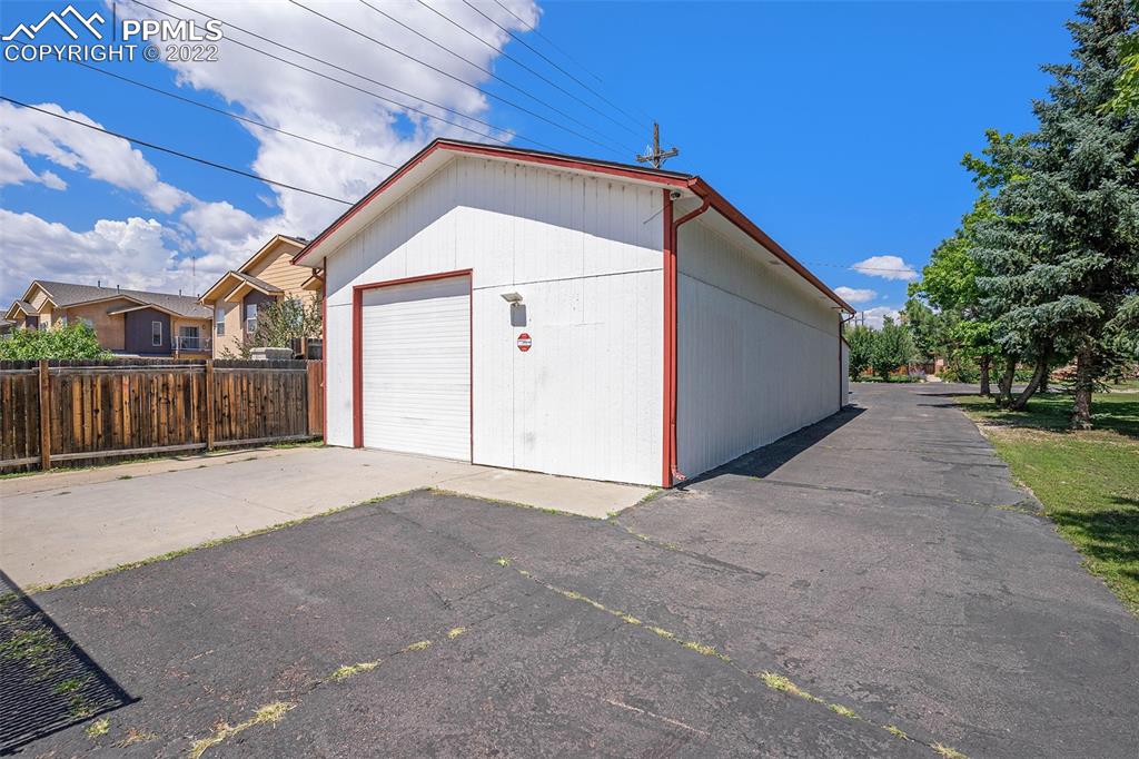 4810 Airport Road Colorado Springs, CO 80916 - Photo 33 of 41 a backyard of a house