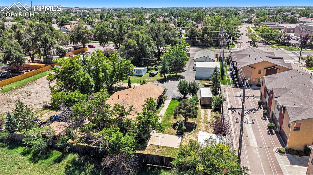 4810 Airport Road Colorado Springs, CO 80916 - Photo 38 of 41 an aerial view of residential houses with outdoor space